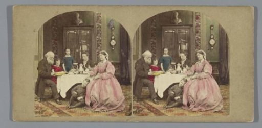 Family at table during morning prayer