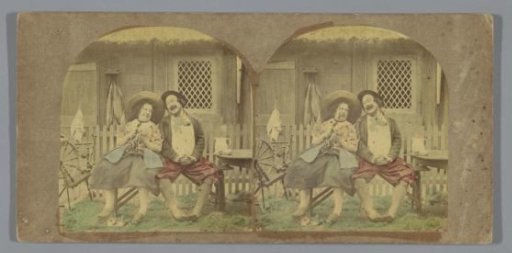 Lovers sitting in front of a house in Flanders