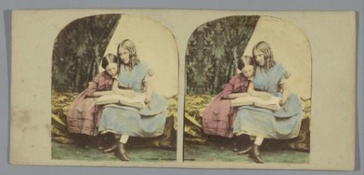 Two Girls with a Book on a Bench
