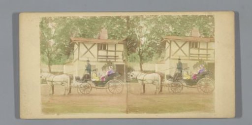 Company in an open carriage with horses in front of a house
