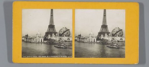 Eiffel Tower and other buildings of the 1900 World's Fair along the bank of the Seine