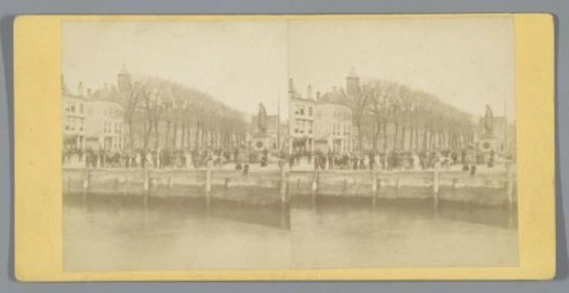 View of a quay with people, all facing the camera, Vlissingen