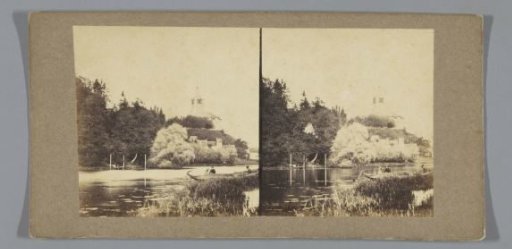 River landscape with a church building