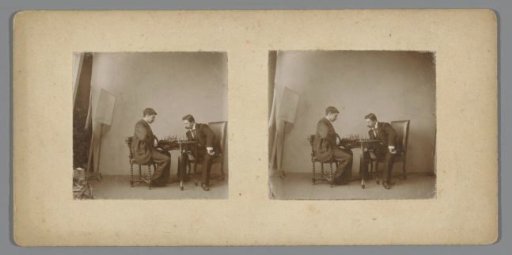 Two men smoking at a table