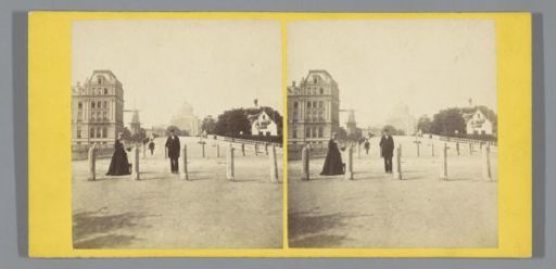 View of a bridge in Amsterdam with the Palace for Industry in the background