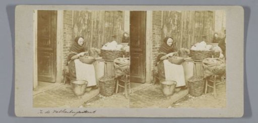 Woman peeling vegetables in the Valkenburgerstraat, Amsterdam