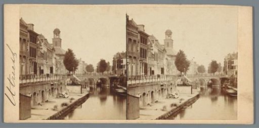 Oudegracht in Utrecht, with the tower of the St. Augustine Church