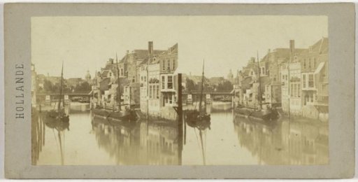 View of the Wijnhaven in Dordrecht with the Nieuwbrug and the Groothoofdspoort in the background