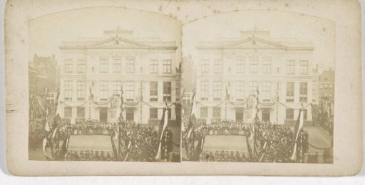 Celebrating crowd in front of the Schieland House in Rotterdam