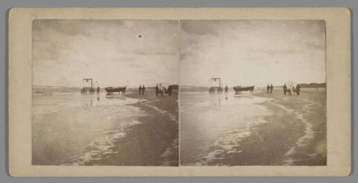 Beach of Scheveningen with a boat and a bathing machine