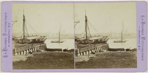 View of the Scheldt with two ships and the city of Antwerp in the background