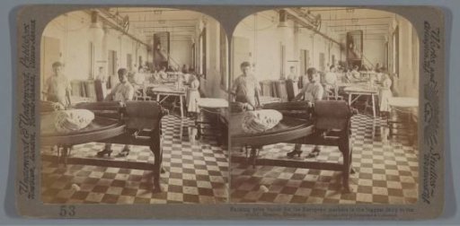 Workers of the world's largest dairy factory packing butter, Haslev, Denmark
