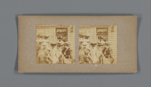 People in front of a shop on the fish market in Bergen, Norway