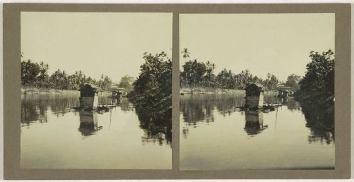 View of a river with floating huts, presumably the Sungai Negara in Borneo, Indonesia