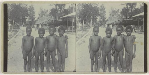 Four children from Manokwari posing in a village street