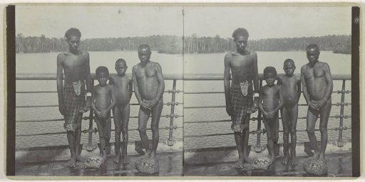 Four native inhabitants of Manokwari, West Papua by the water