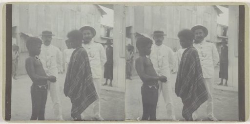 Two Europeans among some Moluccan inhabitants of Dobo, Aru Islands