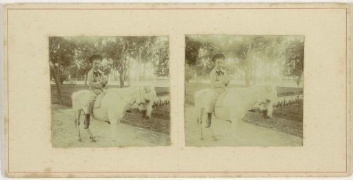 Child on horseback in Padang, Sumatra