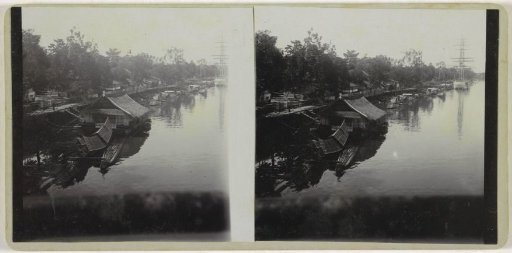 Shore with boats of the presumed Sungai Musi river in South Sumatra near Palembang