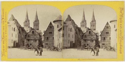 Square in Boppard with a twin-tower facade in the background, Germany