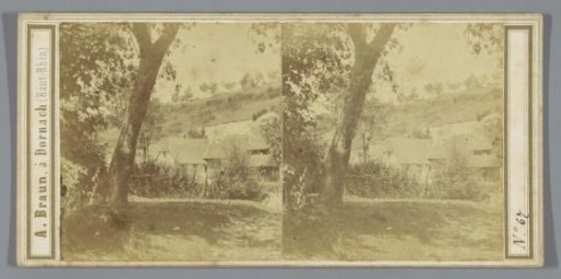 Hilly landscape with a few houses, possibly in Germany