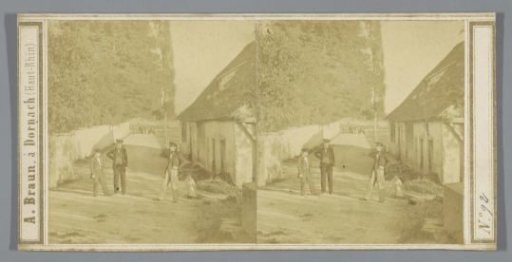 Several men and children on a village road, possibly in Germany