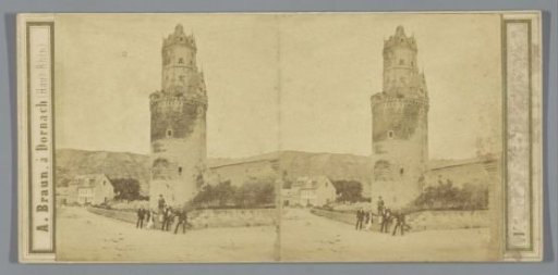 Several men in front of the Round Tower in Andernach