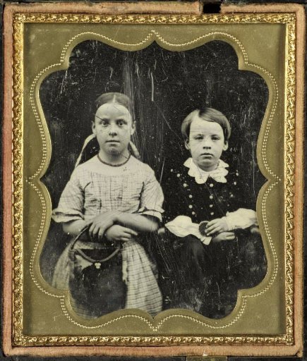 Portrait of an unknown girl and boy