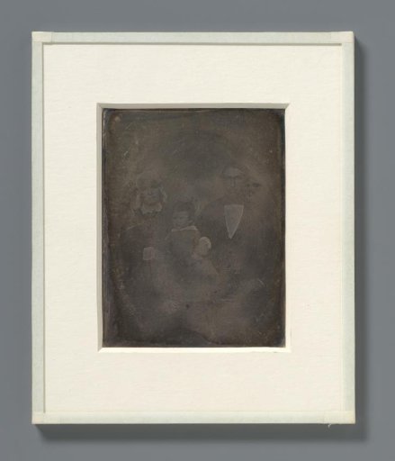 Portrait of an unknown couple with a child
