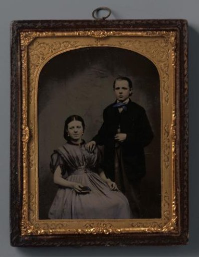 Portrait of an unknown seated girl and an unknown standing boy