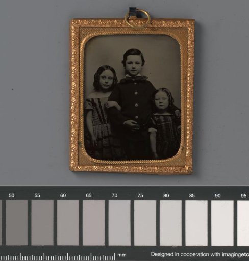Portrait of an unknown boy and two unknown girls