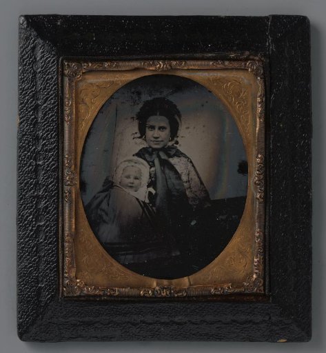 Portrait of an unknown woman with a child on her lap
