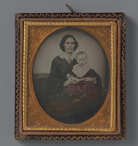 Portrait of an unknown woman with a child on her lap