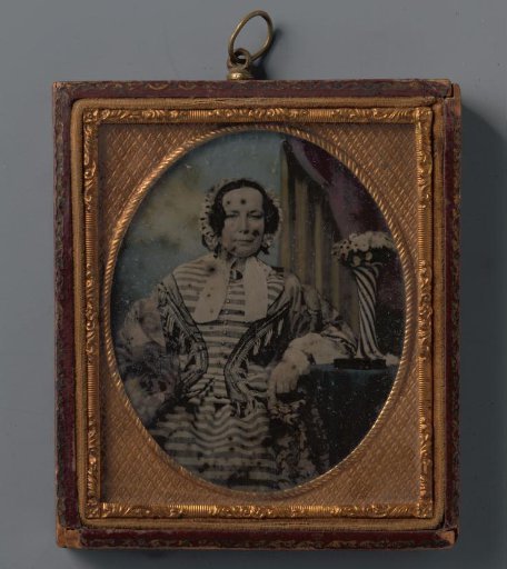 Portrait of an unknown woman with a cap