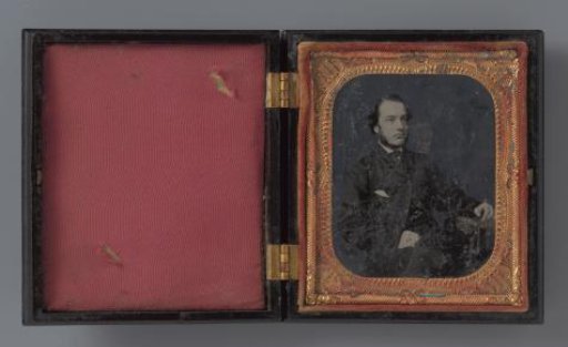 Portrait of an unknown seated young man
