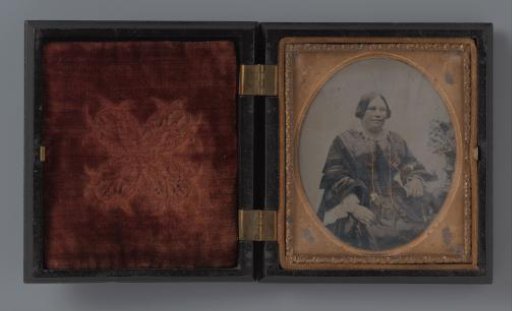 Portrait of an unknown sitting woman