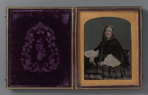 Portrait of an unknown sitting woman