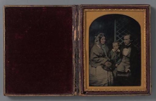 Family portrait of an unknown man, woman and child
