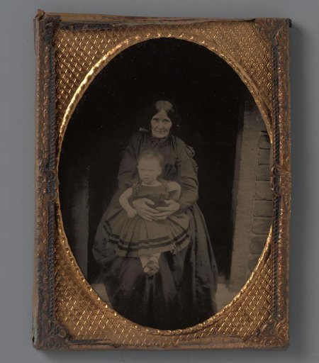 Portrait of an unknown woman with a child on her lap