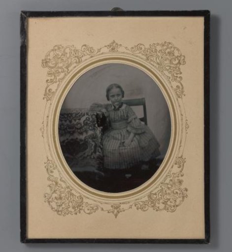 Portrait of an unknown seated girl