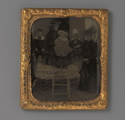 Group portrait of two unknown women and three unknown children
