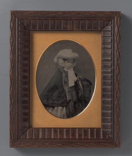 Portrait of an unknown girl with hat