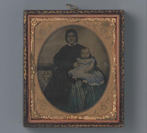 Portrait of an unknown woman with child on her lap
