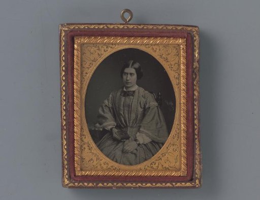 Portrait of an unknown woman with a book in her hand
