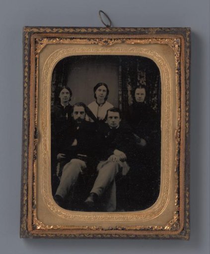 Group portrait of two men and three women