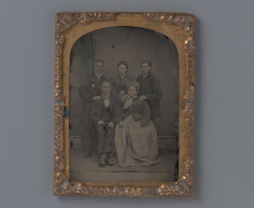 Portrait of a married couple with two sons and a daughter