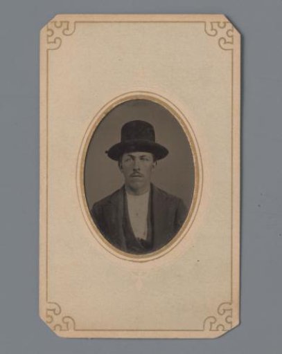 Portrait of an unknown young man with moustache and hat