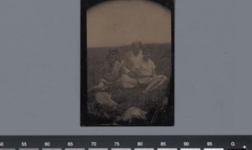 Portrait of an unknown seated woman and two unknown girls