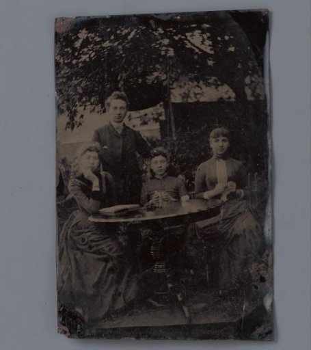 Portrait of an unknown family in a garden