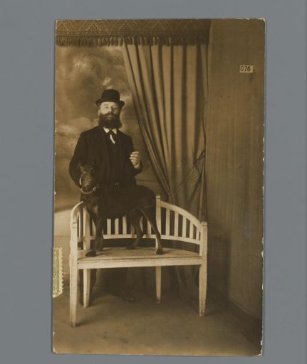 Portrait of an unknown man with a dog